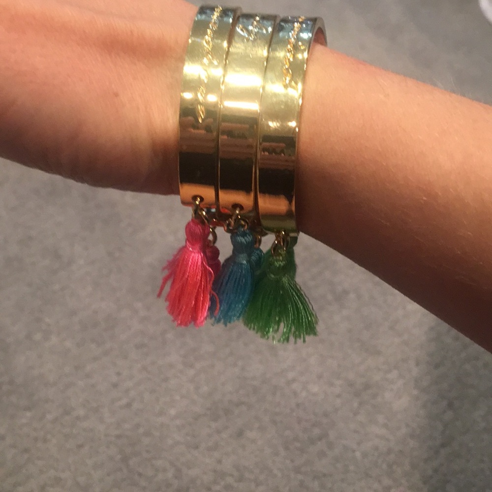 Lilly Pulitzer gold bracelets with tassels